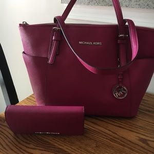 Michael Kors Handbag and wallet in deep pink